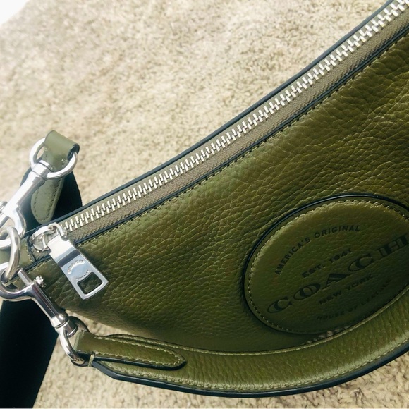 A warm green colour coach bag styled to go with every outfit. - Picture 4 of 4